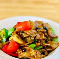 Sichuan Beef 四川牛 · Tender beef slices stir-fried with peppercorn powder, jalapeño, snap peas, bell peppers, whi...