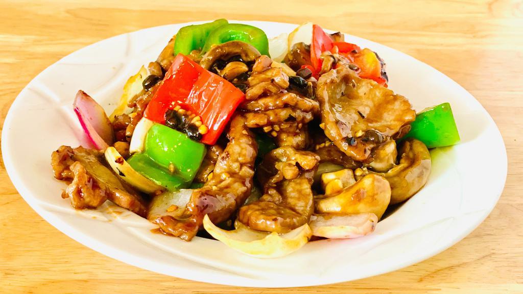 Black Bean Beef 豆豉牛 · Tender beef slices, onions, bell peppers, mushrooms, stir-fried with black bean brown sauce.