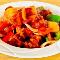 Sweet & Sour Pork 古老肉 · Deep-fried pork nuggets stir-fried with pineapple, bell peppers and white onions in sweet an...