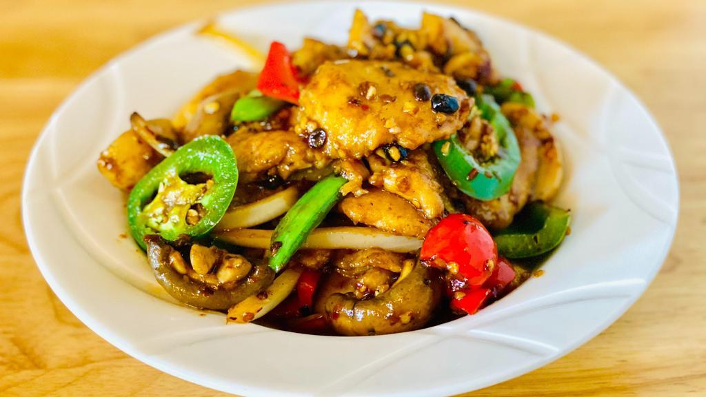 Sichuan Fish 四川魚片 · White fish slices stir-fried with peppercorn powder, jalapeño, snap peas, bell peppers, white onions, mushrooms in brown sauce and black bean sauce.  Spicy.