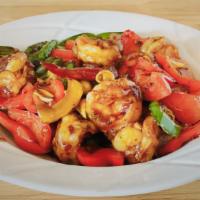 Kung Pao Prawns 宮保蝦 · White prawns stir-fried with bell peppers, chili peppers and peanuts in our delicious brown ...