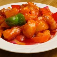 Sweet & Sour Prawns 古老蝦 · White prawns stir-fried with pineapple, bell peppers and white onions in sweet and sour sauce.