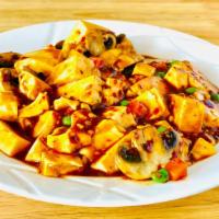 Mapo Tofu 麻婆豆腐 · Soft tofu, mushrooms, peas and carrots cooked in peppercorn sauce. Vegan and spicy.