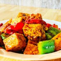 Kung Pao Tofu 宮保豆腐 · Fried tofu stir-fried with bell peppers, chili peppers and peanuts in our delicious brown sa...