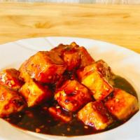 General Tso Tofu 左宗豆腐 · Fried tofu stir-fried in our delicious sweet and spicy brown sauce. Vegan and spicy.