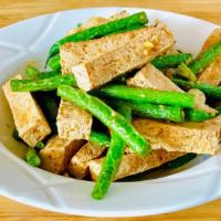 String Bean Tofu 四季豆豆腐 · Sauteed string beans stir-fried with fried tofu. Vegan and non-spicy.