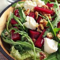 Roasted Red Beet Salad · Roasted Sweet Red Beets tossed in Toasted Walnuts and topped with gorgonzola cheese, Roasted...
