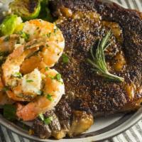 Ribeye Steak & Shrimp · Juicy Ribeye Steak rich in flavor alongside Flavorful Shrimp. Comes with Steamed Sautéed Veg...