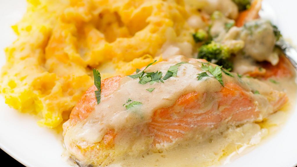 Salmon Plate · Freshly Grilled and Perfectly Seasoned Salmon Filet. Comes with Steamed Sautéed Vegetables and your choice of Creamy Mashed Potatoes with Gravy or Roasted Yams.