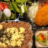 Soboro Bento · Minced chicken with yakitori sauce and egg over rice,salad,potato croquette,two small side d...