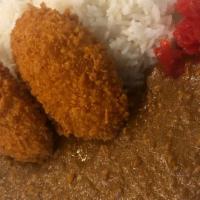 Potato croquette curry · Minced chicken and vegetables curry sauce,potato croquette,rice , salad