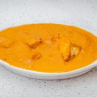 Paneer Tikka Masala · Homemade cottage cheese cooked in creamy tomato and onion sauce.