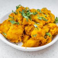 Aloo Gobi · Vegetarian. Fresh organic cauliflower and potatoes cooked with spices.
