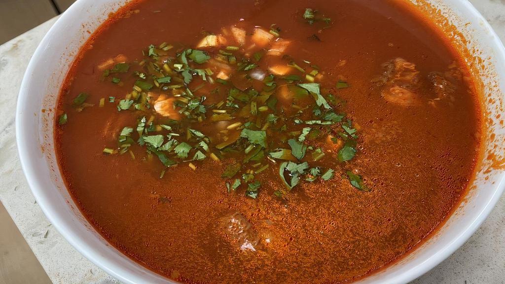 C6. Menudo · Authentic hominy and beef tripe soup.
