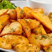 Potato Wedges · Keep it simple with our thick cut wedges seasoned with secret spices.