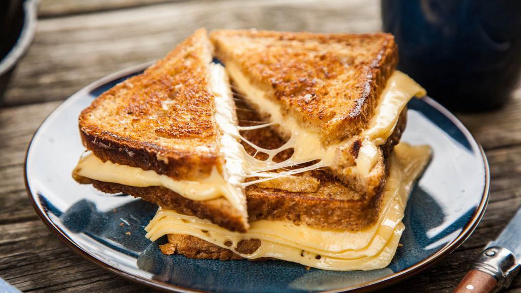 Classy Grilled Cheese · Keep it classy with our delicious based blend of four cheese atop fresh bread. Go wild and add your own selection of toppings and protein for an additional charge. Make it Gluten Free or vegan for no additional cost.
