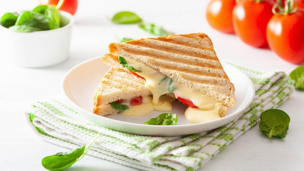 Millionaire Grilled Cheese · Indulge in this cheesy dish featuring maple-glazed thick cut bacon and gouda without the million dollar price tag. Want to make it extra special? Go wild and add your own selection of toppings and protein for an additional charge. Make it Gluten Free or vegan for no additional cost.
