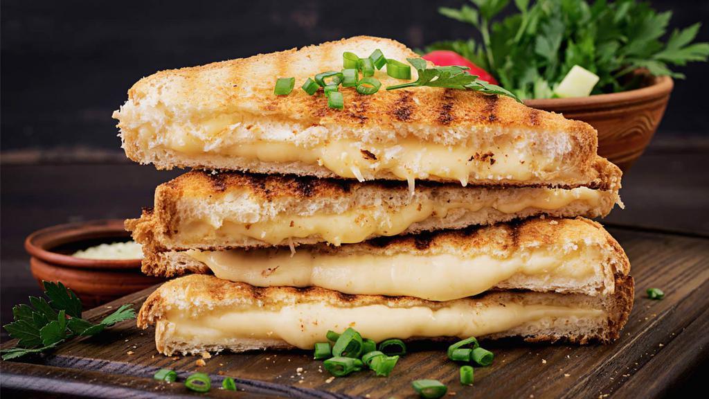 Seoul Food Grilled Cheese · A Korean style Grilled Cheese made with spicy gochujang braised beef, tangy kimchi, and melted gruyere. Go wild and add your own selection of toppings and protein for an additional charge. Make it Gluten Free or vegan for no additional cost.