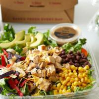 Southwest Chicken · Grilled chicken, corn, black beans, jack & cheddar cheese, avocado, and tortilla strips on t...