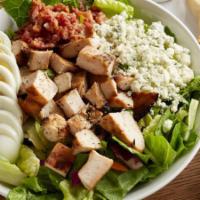 Classic Cobb · Grilled chicken with bacon, hard boiled egg, and bleu cheese crumbles on fresh salad greens.