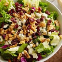 Cranberry Bleu · Salad greens topped with tangy cranberries, crumbled bleu cheese and candied walnuts.