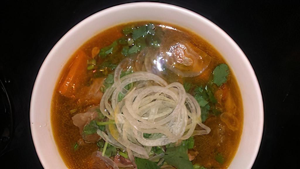 10. Beef Yellow Noodle Soup (Mi Bo Kho) · 