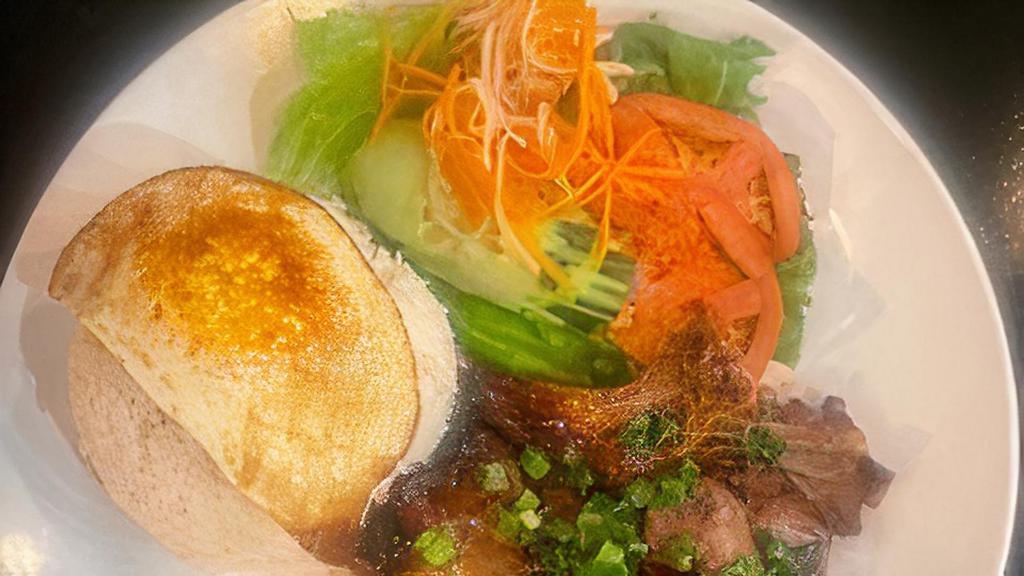 6. BBQ Pork Chop with Rice (Cơm Heo Nướng) · 