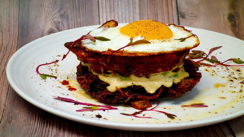 Egg Tower · A crispy and freshly made hash brown/potato cake at the base of the egg tower. Added a spread of homemade creamy Hummus, Avocado slices and a layer of flavorful Shakshuka to the build. All topped with a sunnyside egg.
Vegetarian, Gluten-Free, Dairy Free, Soy Free, Peanut Free.