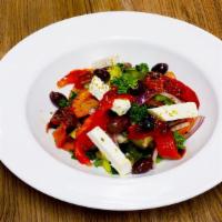 Afthentikí Greek Saláta · Authentic Greek Salad made with fresh ingredients. Oven roasted bell peppers, Tomato, Cucumb...