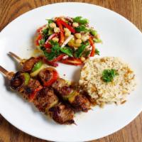 Lamb Souvlaki · Lamb Skewers / Rice / Spring Salad.