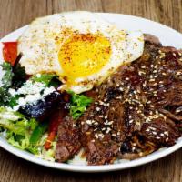 Kríti Beef Bowl · The beef is seasoned and marinated with authentic Greek spices, then rested in overnight. Th...