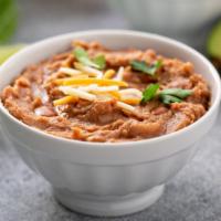 Refried Beans (5 oz.) · Homemade refried beans made with our house seasonings.