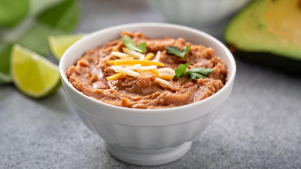 Refried Beans (5 oz.) · Homemade refried beans made with our house seasonings.