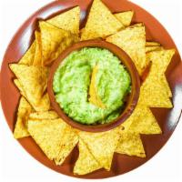 Chips & Guacamole (3 oz.) · Hot & Crisp Mexican-style chips with a serving of fresh Guacamole.