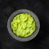Guacamole · Fresh guacamole made with avocados, herbs, seasonings, and lime.