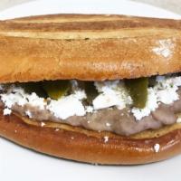 Beans & Cheese Torta · New item. Refried beans, Michoacan cheese, and jalapeño.