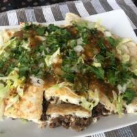 Regular Quesadillas · Cheese, meat, lettuce, salsa, onion, cilantro.