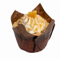 Mango Cream · Filled with mango, topped with whipped cream, graham crumbs and dried mango