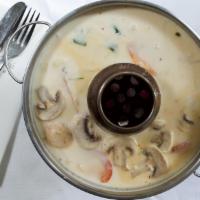 13. Tom Kha Gai · Chicken coconut soup with mushrooms.