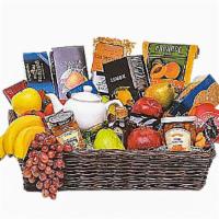 Grande Gourmet Fruit Basket · When you want to send your thoughts in a grande way, send this basket filled with fresh frui...