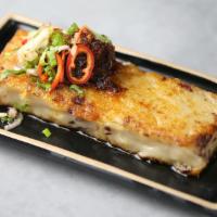 Radish Cake With Sauce | XO醬煎蘿蔔糕 · cured sausage & bacon filled, topped with XO chili sauce