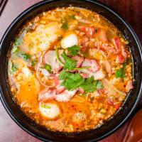 L. Tom Yum Noodle Soup · Your choice of noodle with pork sliced, ground pork, sliced fish cake, fish balls, and bean ...