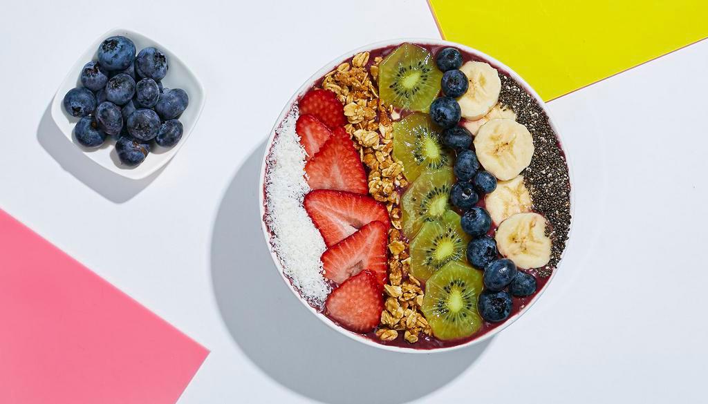 Fresh And Fruity Acai Bowl · Refreshing acai topped with granola, bananas, strawberries, blueberries, mango, shredded coconut, and chia seeds.