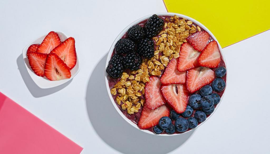 Berry Acai Bowl · Refreshing acai blend topped with granola, strawberries, blackberries, and blueberries.