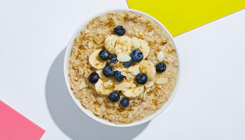 Blueberry Banana Oatmeal · Warm rolled oats with banana, blueberries, and almonds.