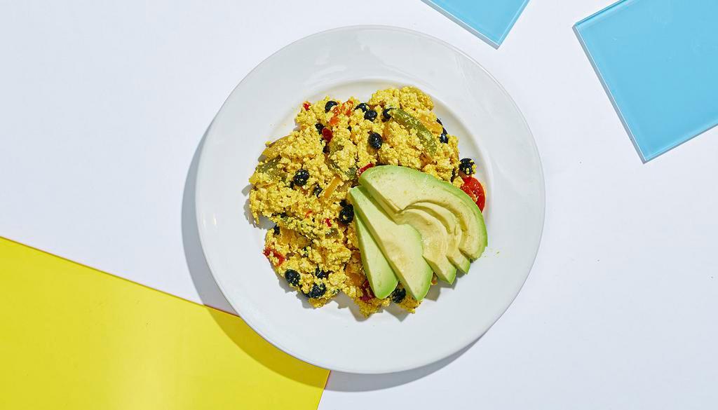 Southwest Scrambled Tofu · Scrambled tofu with sauteed peppers and onions, black beans, diced tomatoes, and avocado.