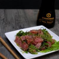 Poki Salad · Seaweed salad with your choice of salmon or tuna. Need utensils? Make sure to add on utensil...