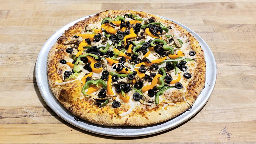 Veggie · Red Tomato Sauce, Shredded Mozzarella Cheese, Mushrooms, Onions, Multi Color Bell Peppers and Black Olives.