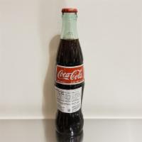 Mexican Coke · 12.5oz Glass Bottle of Coke.  Imported from Mexico.