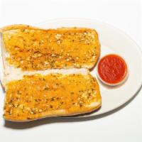 Garlic Bread · Bread, topped with garlic and olive oil or butter, herb seasoning, baked to perfection. Melt...